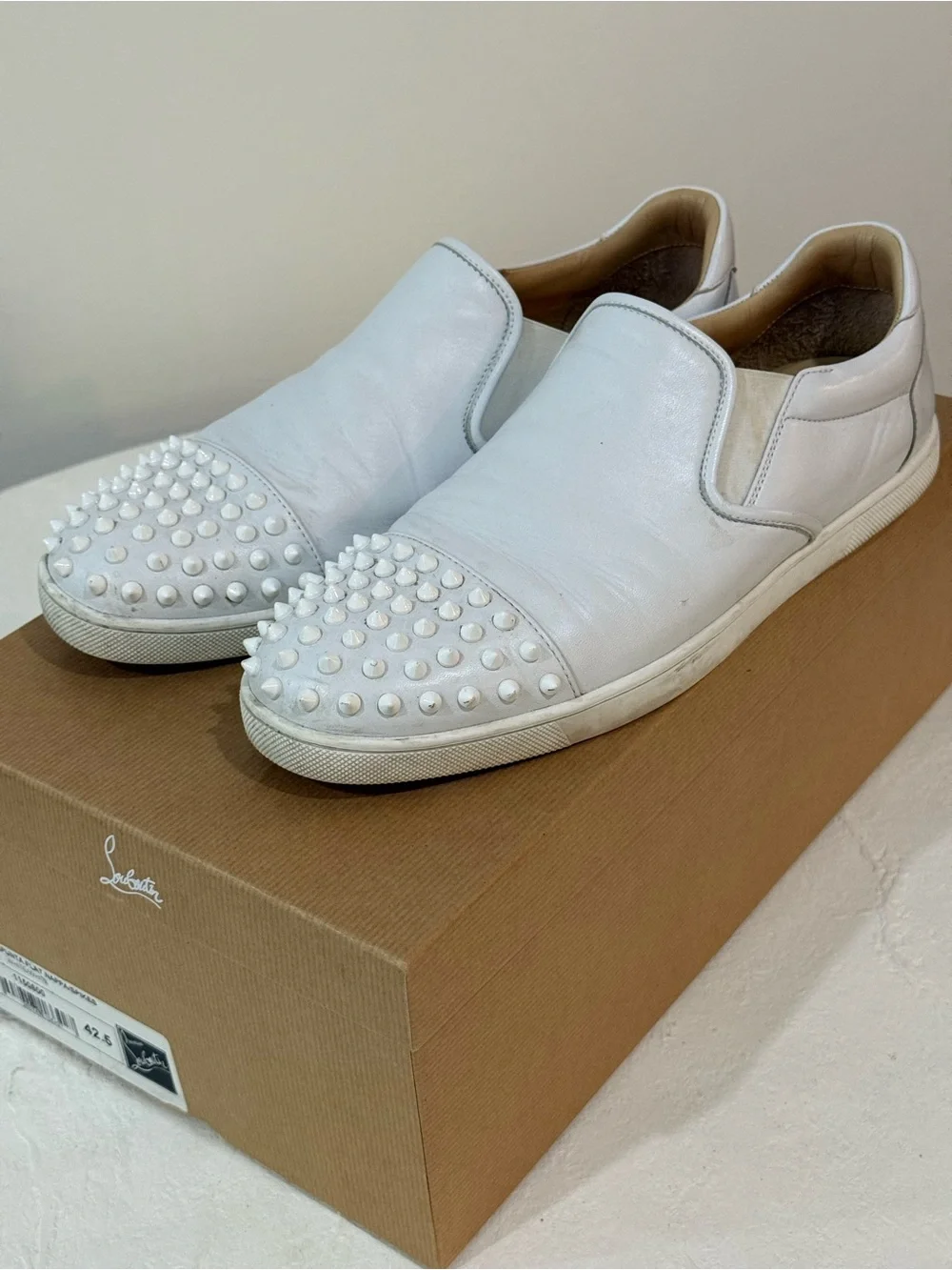 Christian Louboutin Men’s white boat sneaker spikes